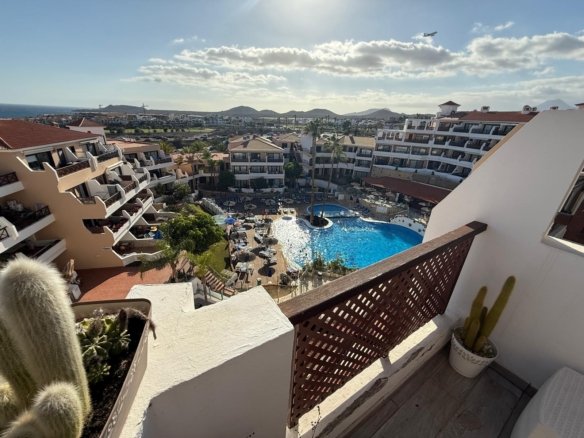 View from the terrace overlooking the pool and ocean at Royal Park Albatros, Golf del Sur